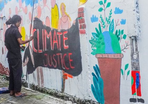 Mural For Justice : Menggambar Pesan Solidaritas dan Tuntutan Keadilan di Tembok Perlawanan Rumah Gerakan Rakyat WALHI Riau
