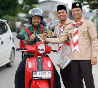 Semarak Ramadhan, Kwarcab Pelalawan Bagikan Ratusan Takjil Serta Santuni Anak Yatim
